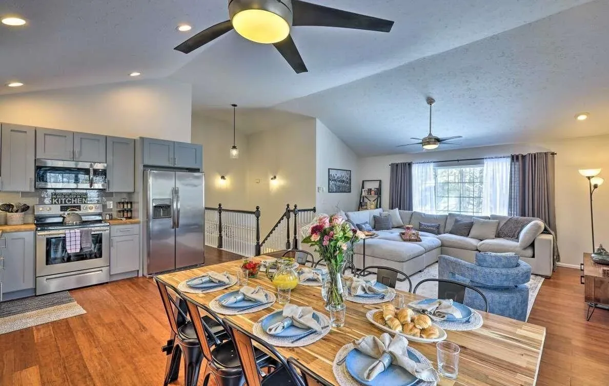 Poconos open-concept dining, kitchen, and living area prepared for group stays