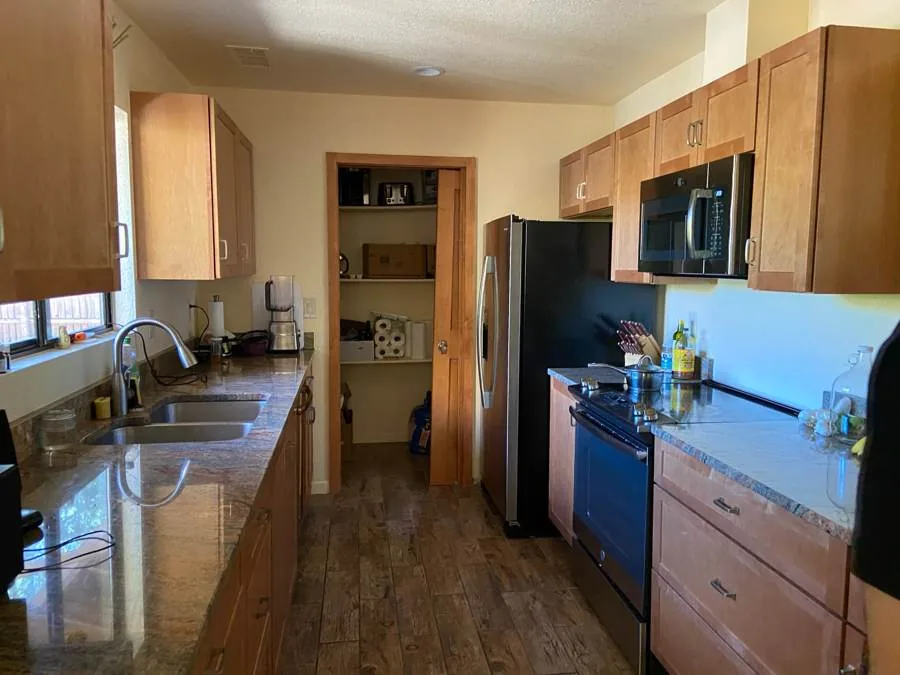 Sedona kitchen before renovation: maple cabinets and granite counters