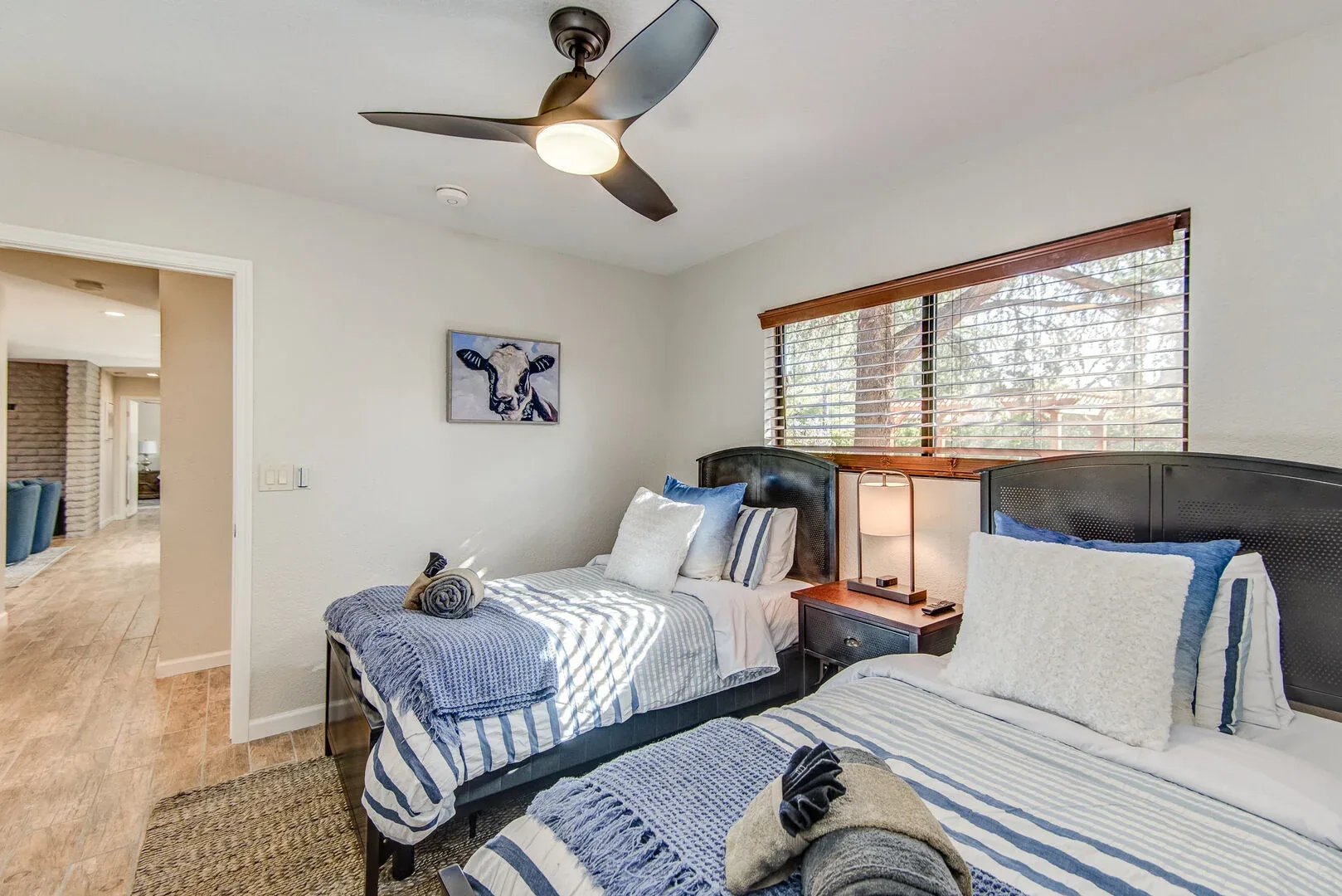 Sedona twin bedroom with two blue-and-white styled beds