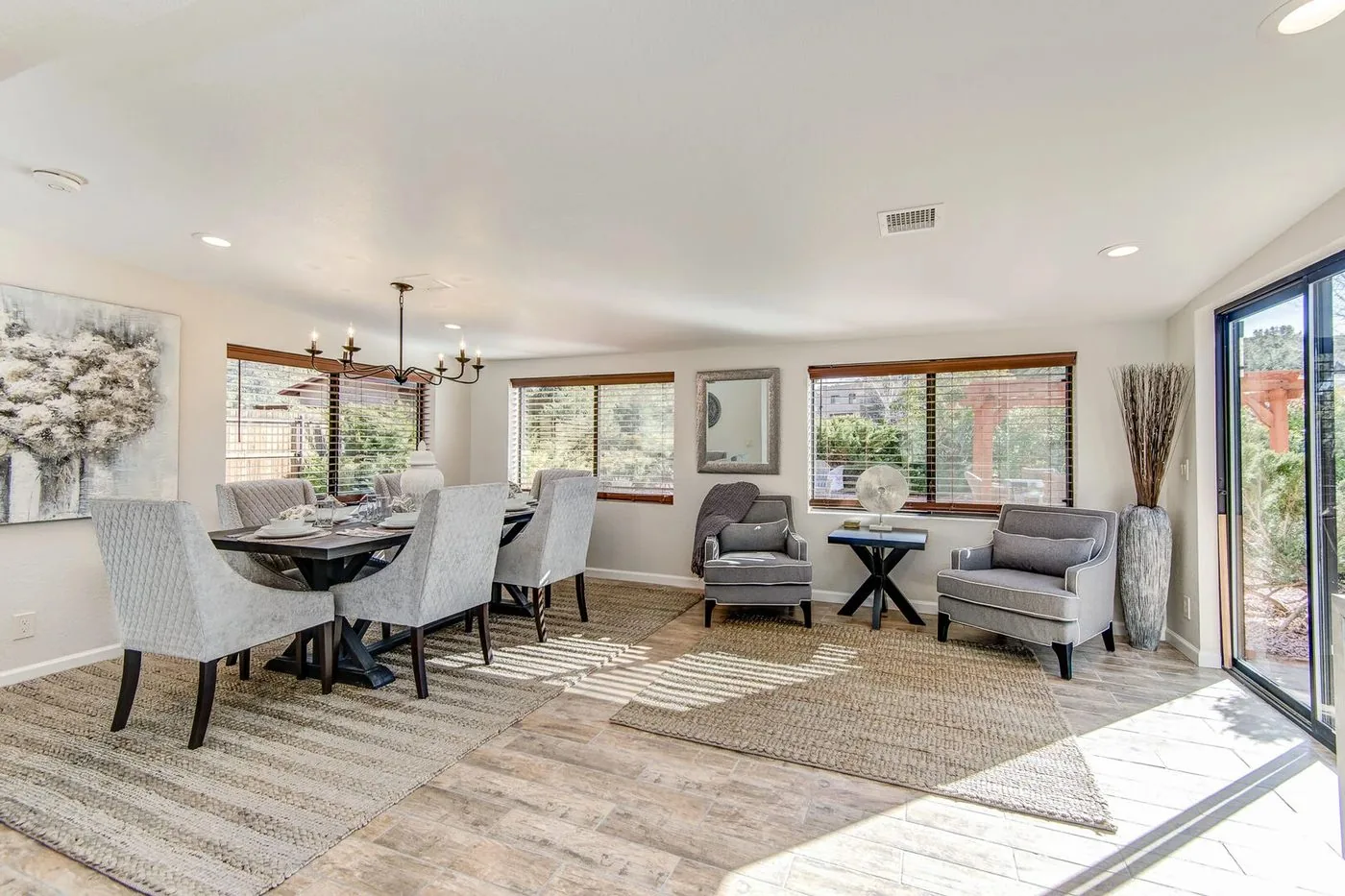 Styled Sedona dining and sitting area with sliding doors to the patio