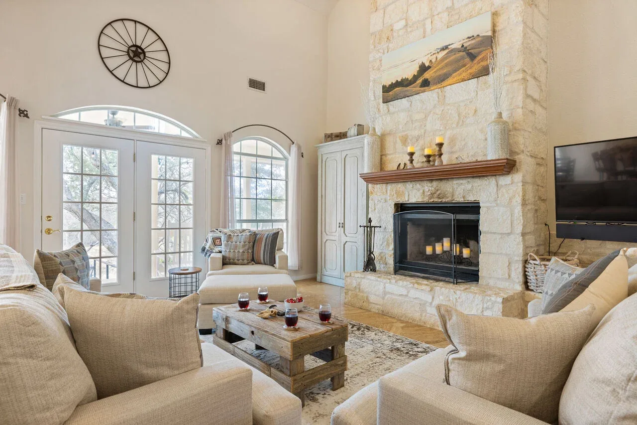 Texas living room with stone fireplace and guest-ready seating